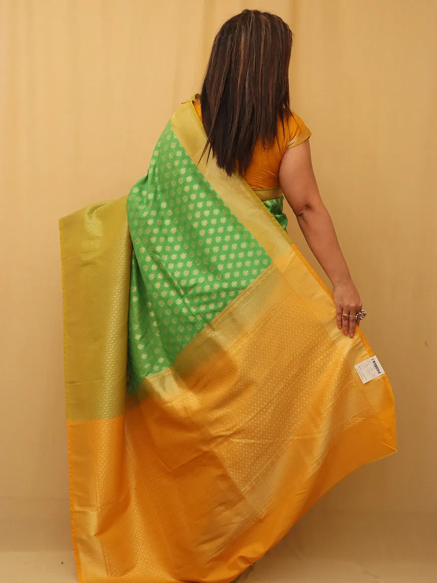 Get your hands on stunning Green Handloom Banarasi Silk Sarees online!