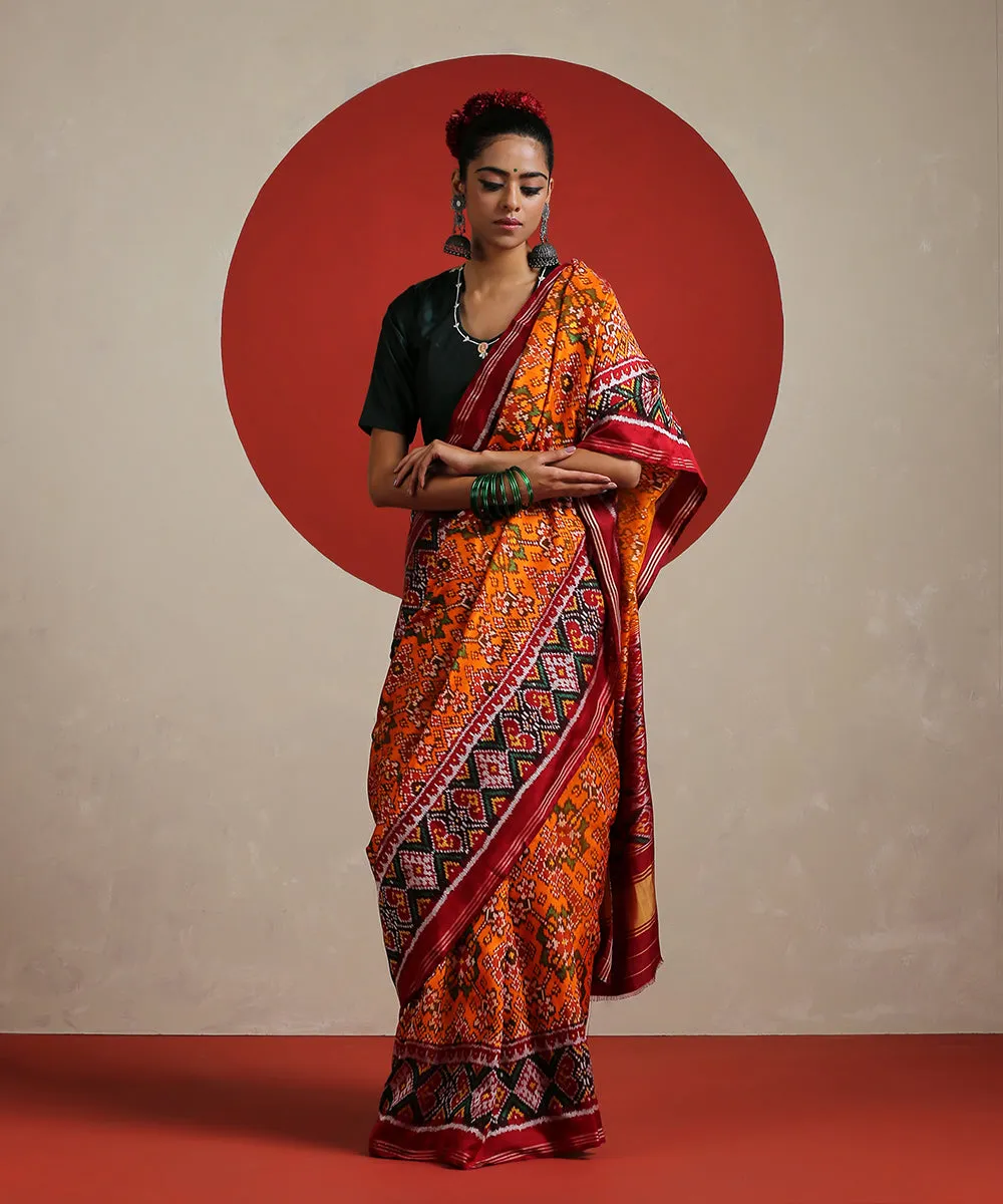 Handloom Orange Pure Mulberry Silk Ikat Patola Saree With Twill Weave