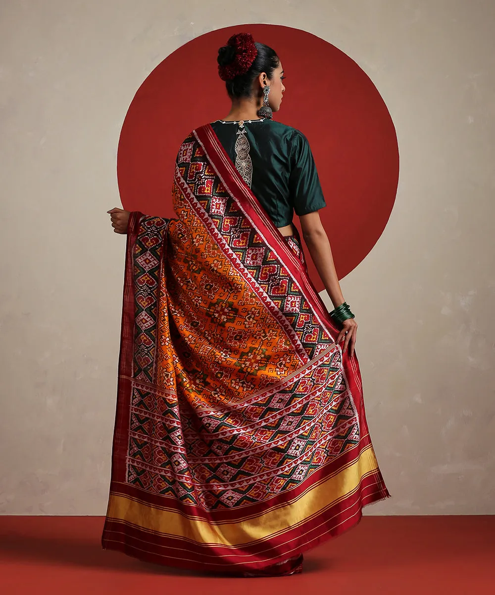 Handloom Orange Pure Mulberry Silk Ikat Patola Saree With Twill Weave