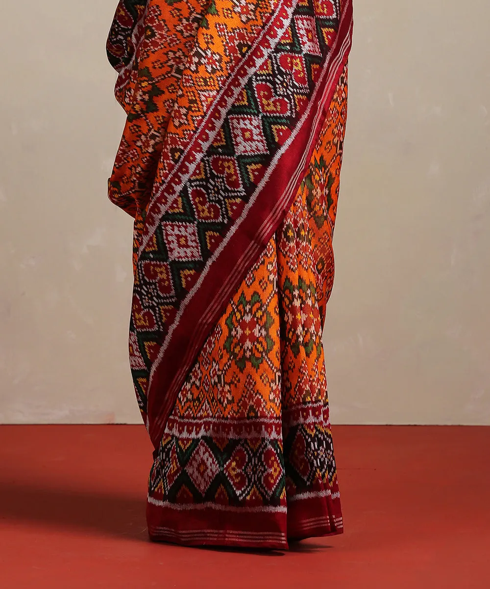 Handloom Orange Pure Mulberry Silk Ikat Patola Saree With Twill Weave