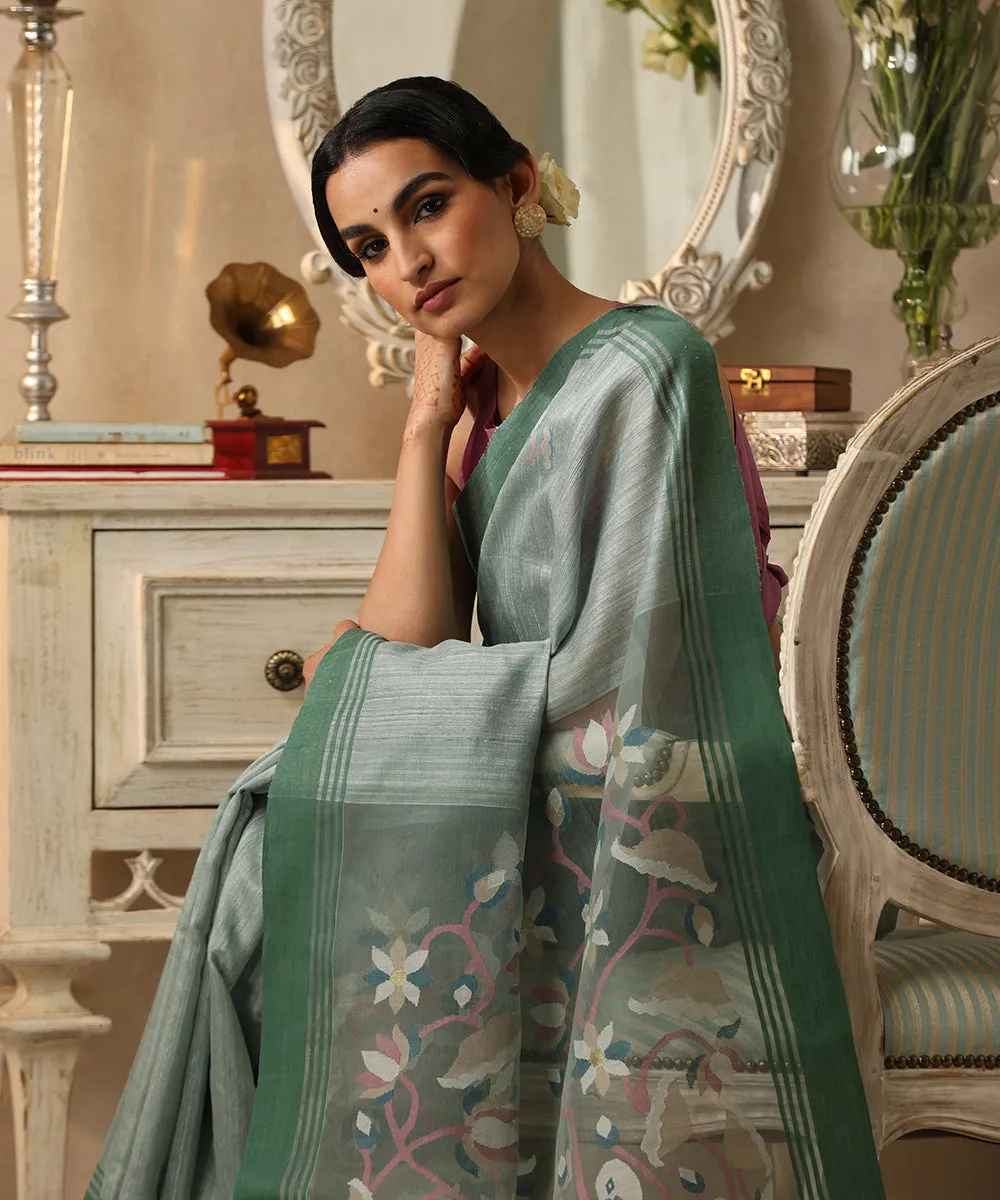 Hansini Handloom Ice Grey Matka Silk Dhakai Jamdani Saree With Swan Motif On Pallu